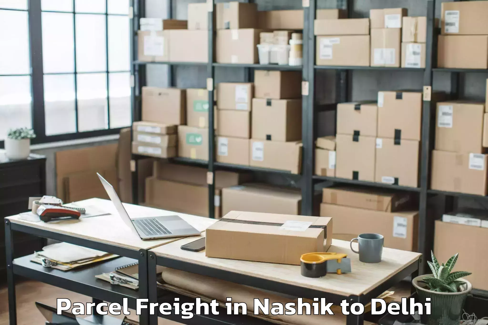 Book Nashik to Mgf Metropolitan Mall Delhi Parcel Freight Online